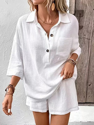 Crisp cotton two-piece set in white with button-up shirt and shorts.