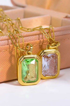 Gilded Prism Pendant Necklace with emerald green and transparent crystals, 18K gold chain.