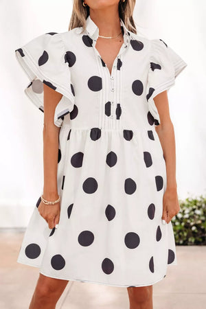 White polka dot mini dress with ruffled sleeves and button-down collared neckline.