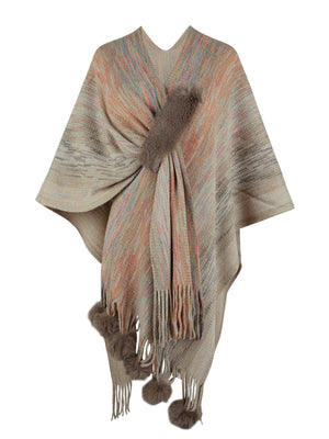 Knit wrap coat with multicolor stripes, faux fur trim, and pom-pom embellishments.
