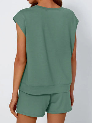 Relaxed cap-sleeve loungewear set in green, featuring a crew neck top and matching shorts.