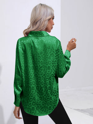 Green satin leopard print blouse with a collared neckline and long sleeves.