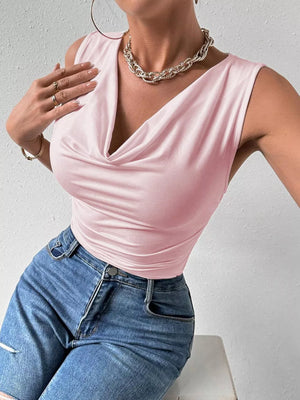 Pink ruched cowl neck tank top with draped neckline and sleeveless cut.