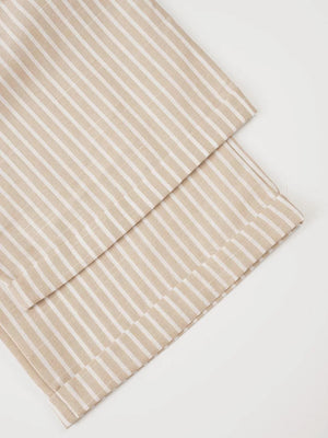 Chic high-waisted wide-leg pants in beige and white vertical stripes.