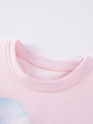 Toddler blush pink t-shirt with a round neckline and a playful dinosaur graphic detail.