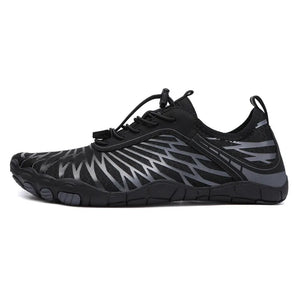 Black adaptive mesh trail runners with grey geometric pattern and quick lace.