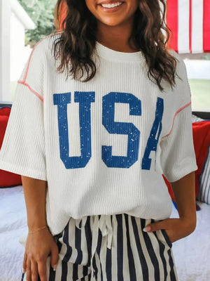 White ribbed t-shirt with blue USA graphic and contrast red stitching