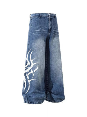 Men's blue denim wide leg jeans with tribal print detail