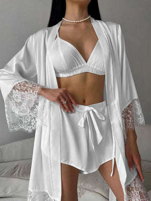 White lace trim three-piece loungewear set with bralette, shorts, and robe.