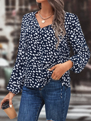 Dark Blue polka dot blouse with tie-neck detail and long sleeves
