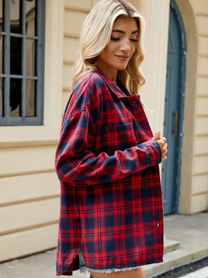 Red and navy plaid collared long sleeve shirt with button detail