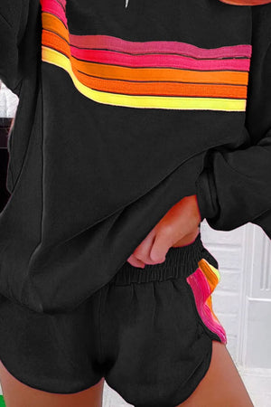 Black loungewear set with retro stripe detail on sweatshirt and shorts