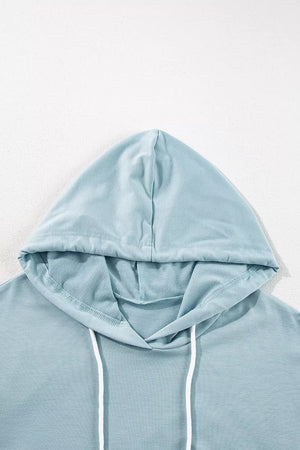 Solid Ruffled Hem Loose Fit Tunic Hoodie in Light Blue, fabric detail