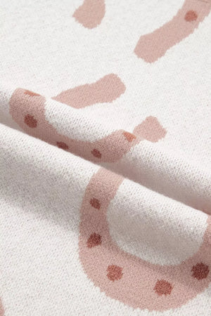 Charming Western Print Knit Top in white with pink abstract pattern and textured knit fabric.