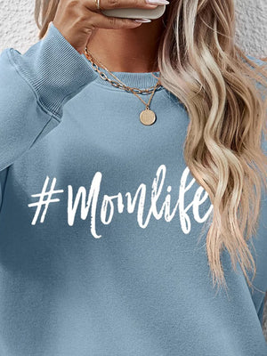 Momlife crewneck sweatshirt in Misty Blue with white graphic text.