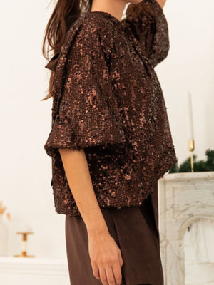 Dazzling sequin tie-back blouse in dark brown with short sleeves.