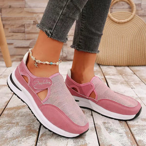 Pink cutout mesh platform slip-on sneakers with "Fashion" detail