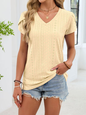 Pastel yellow eyelet v-neck tee with petal sleeves and a textured pattern.