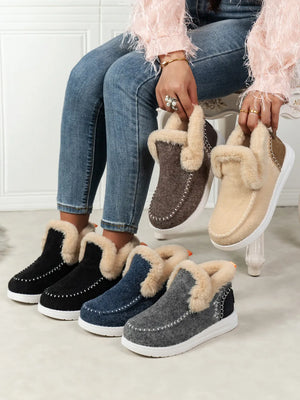 Felted stitch-detail shearling slippers in navy, black, gray, chocolate, and beige.