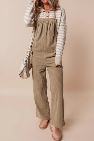 Camel corduroy wide-leg overalls with a bib front and adjustable straps.