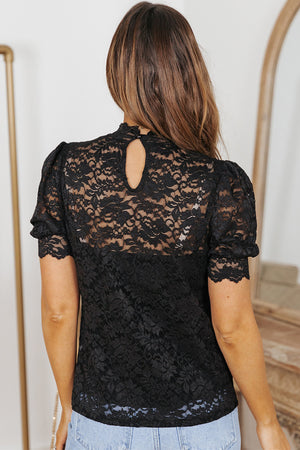 Black lace puff sleeve mock neck blouse with keyhole back detail