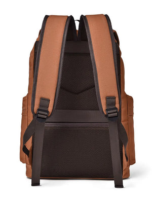 Travel-ready canvas backpack in ochre with padded straps and mesh back panel.