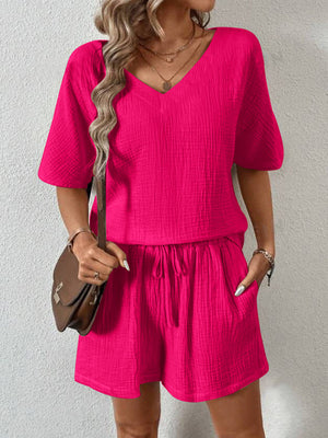 Hot Pink textured gauze lounge set with V-neck top and drawstring shorts.