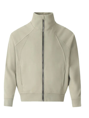 Sage zip-up sweatshirt with sculpted seams and mock neck.
