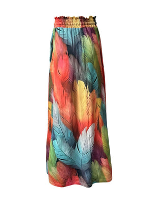 Maxi skirt with multicolor feather print, smocked waist, and pockets.