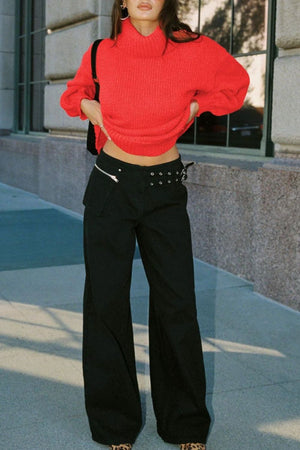 Black flared denim trousers with utility buckle and zip details
