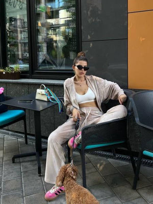 Plush velour lounge set in sand color with wide leg pants and a relaxed fit jacket.