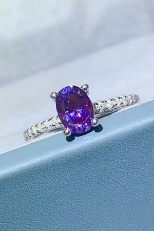 Amethyst oval pavé ring with a silver band.