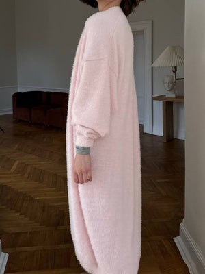 Plush maxi cardigan in blush pink with balloon sleeves and a soft, fuzzy texture.