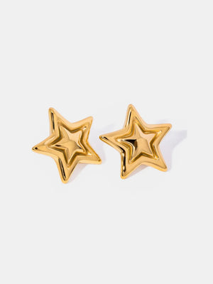 Gold starburst stud earrings with sculpted detail