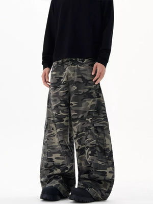 Oversized camouflage cargo sweatpants with multiple pockets and a relaxed fit.