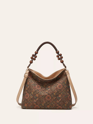 Brown bohemian hobo tote with geometric pattern and beaded handle