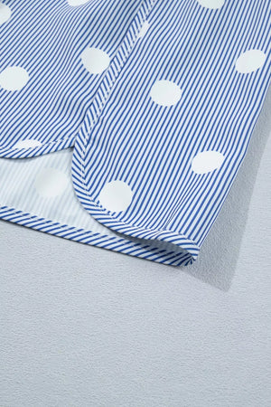 Blue and white striped polka dot shorts with a cuffed hem.