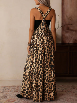 Leopard print wide leg romper with adjustable straps and a black bodice.