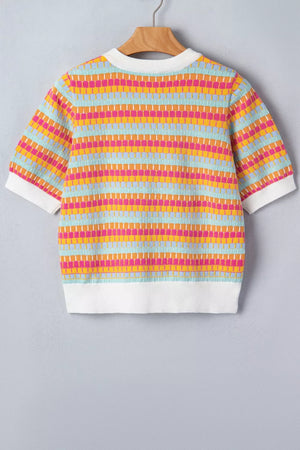 Vibrant abstract knit sweater with crew neck and short sleeves, featuring colorful horizontal stripes and white ribbed trim.