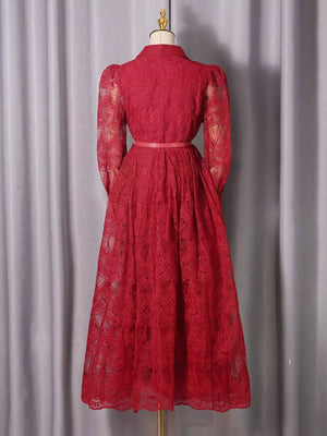 Red lace midi dress with button placket, collared neckline, and puff sleeves.
