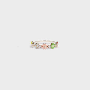 Silver enamel floral cluster ring with colorful flowers and clear stones