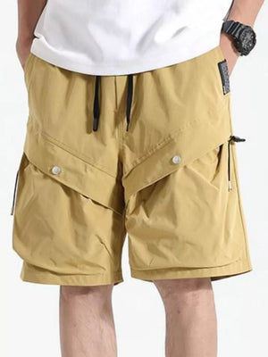 Relaxed fit mustard cargo shorts with drawstring waist and multiple pockets.