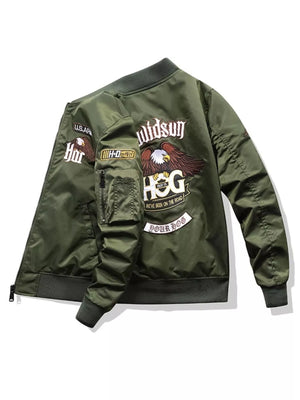 Army green embroidered bomber jacket with eagle and text patches, zip front, and utility pocket.