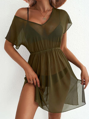 Green sheer mini dress with V-neck, short sleeves, elastic waist, and thigh slit.