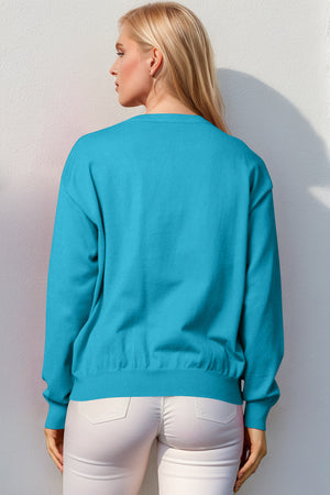Cerulean crewneck sweater with ribbed cuffs and hem, acrylic knit.