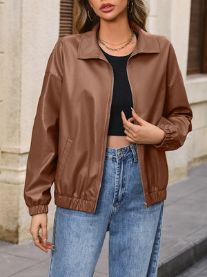Brown faux leather bomber jacket with zip front and elastic cuffs