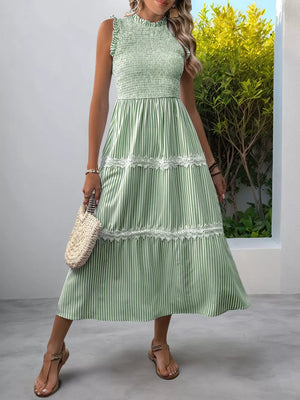 Green striped midi dress with smocked bodice and lace trim tiers