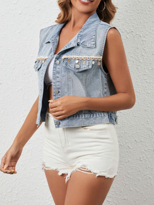 Light blue denim vest with lace trim and beaded embellishments on chest pockets.