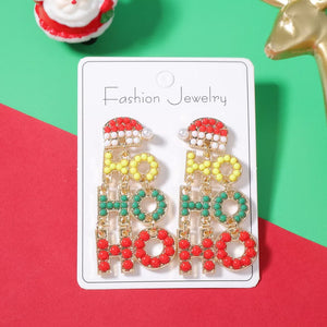 Festive holiday earrings with "HO HO HO" text, Santa hat design, red, green, yellow beads, 18k gold.