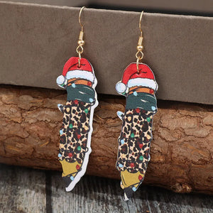 Festive pencil drop earrings with Santa hat, leopard print, and Christmas lights.
